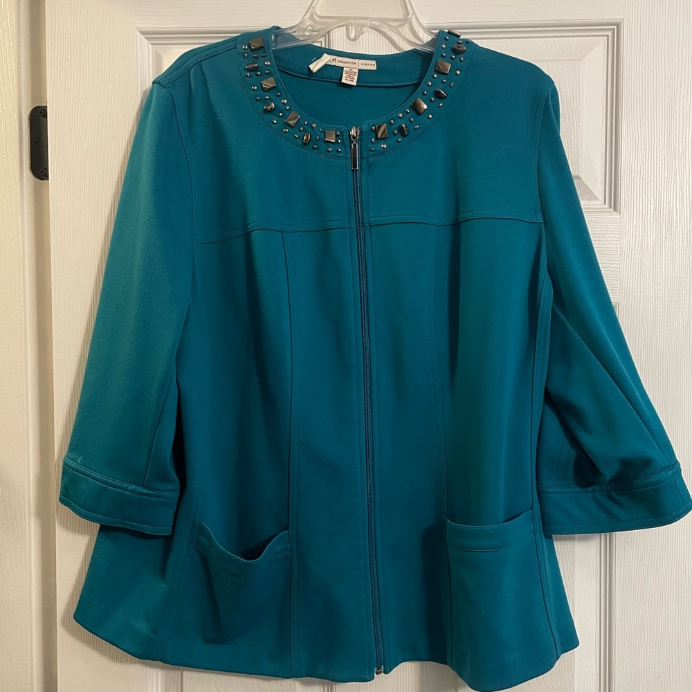 JM collection jacket with quarter sleeve and pockets.
